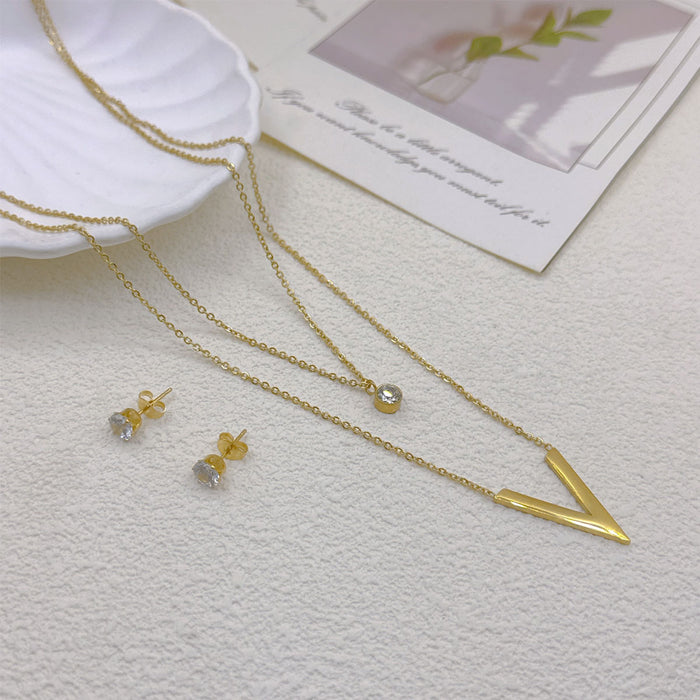Aretes de acero inoxidable y titanio chapados en oro con forma de estrella al por mayor