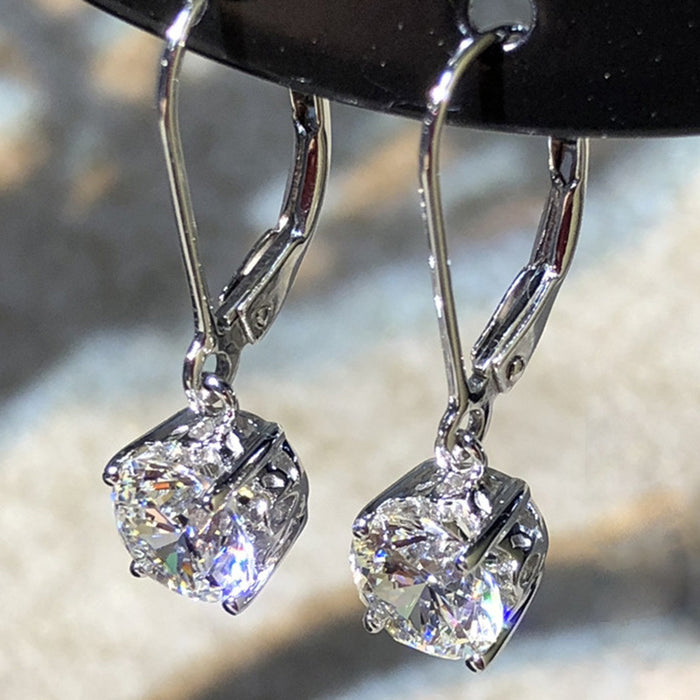 Classic four-claw zircon earrings