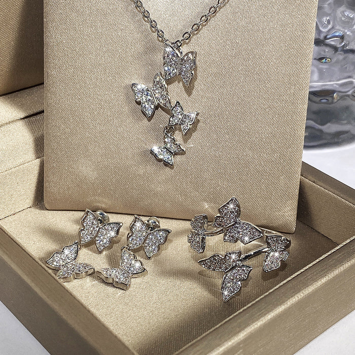 Four butterflies inlaid with diamond clavicle chain fashion set