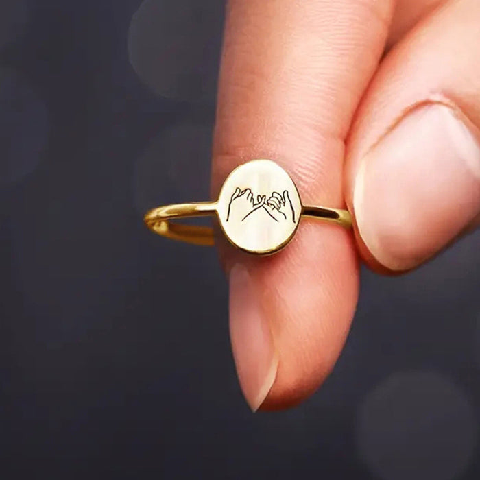 Women's geometric oval laser engraved ring