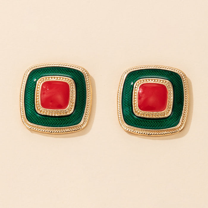 Pendientes geométricos con forma de gota de aceite en color rojo