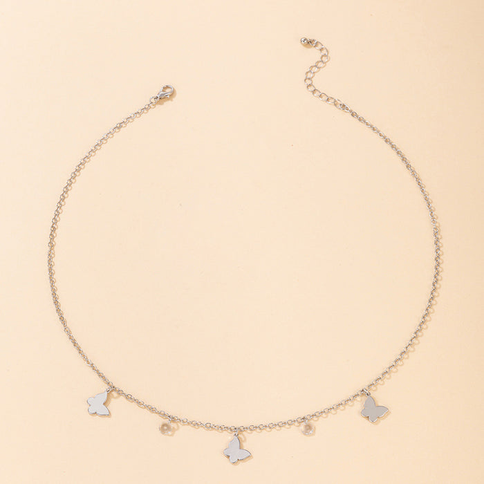 Collar con borlas de estrellas y lunas: cadena minimalista de varias capas para mujer