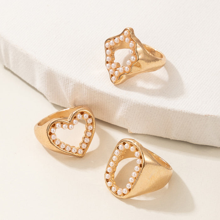 Hollow pearl inlaid irregular geometric O letter ring