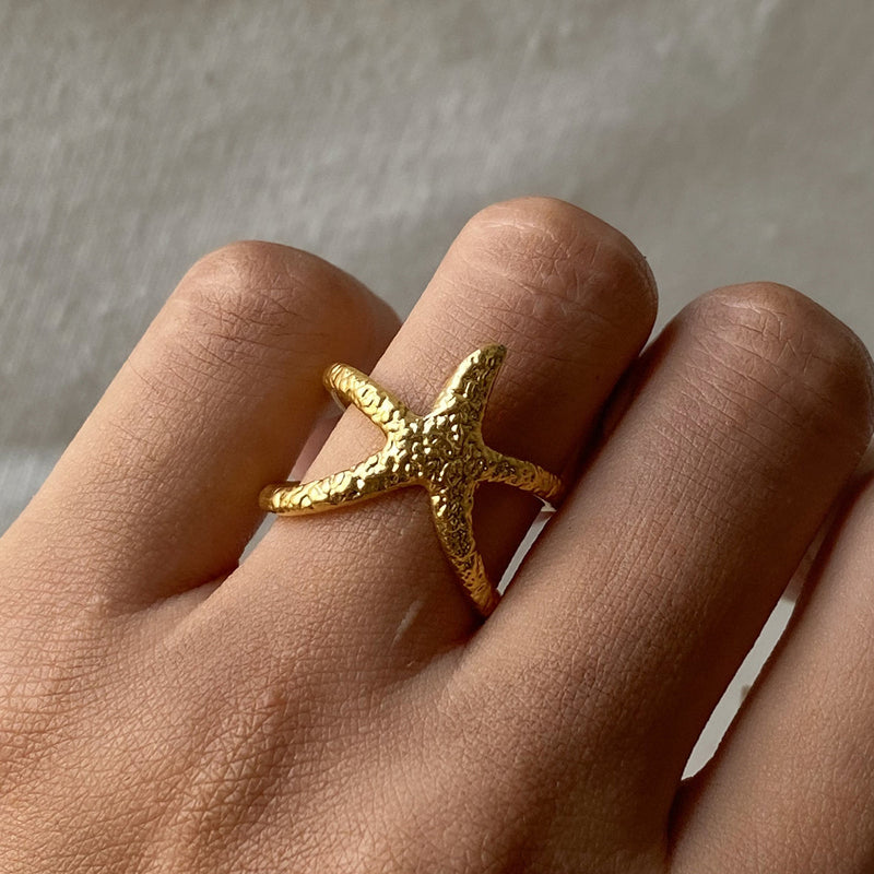 Anillo abierto de estrella de mar de acero inoxidable