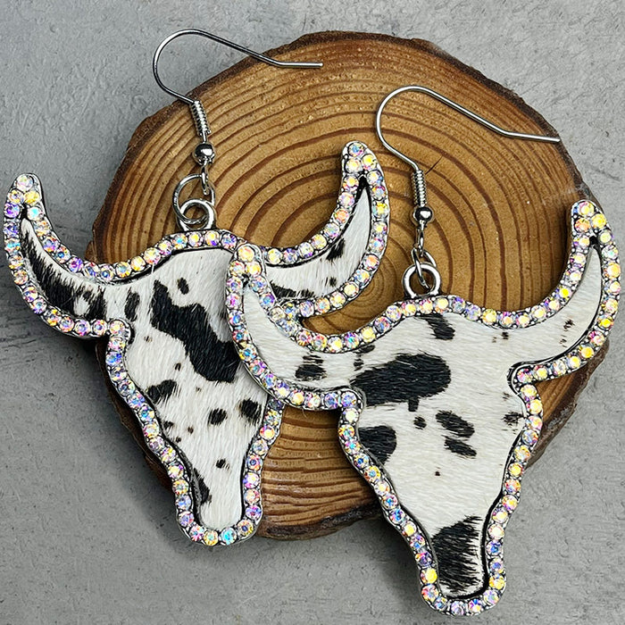 Pendientes de cabeza de toro de cuero con brillantes diamantes de imitación y diseño de piel de vaca