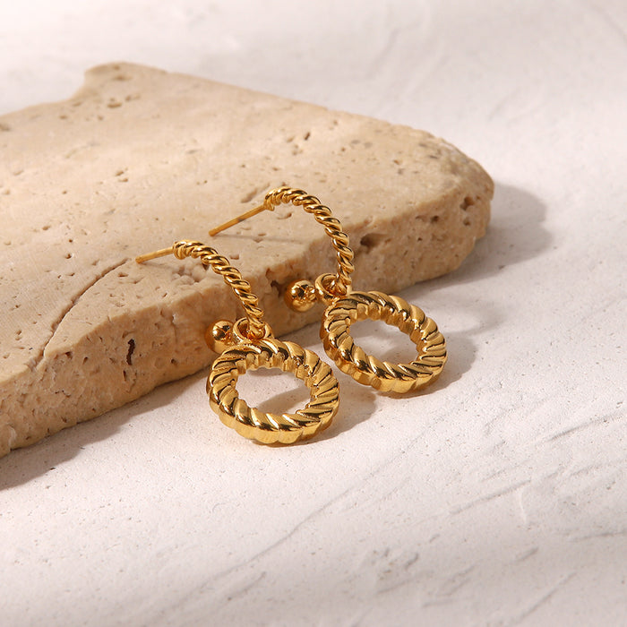 Pendientes de aro trenzados vintage franceses: joyas de diseño de alta gama para otoño/invierno 2024