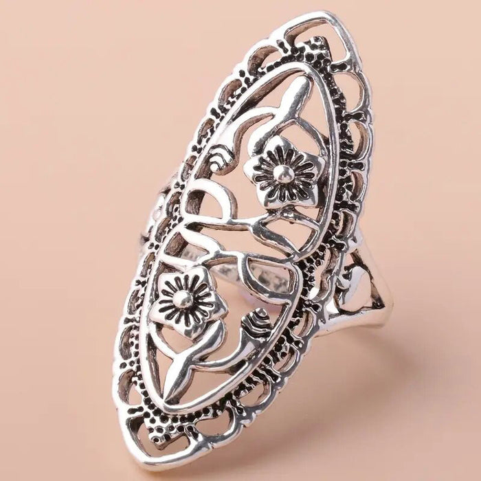 Patterned hollow flower ring alloy plum blossom fashion ring