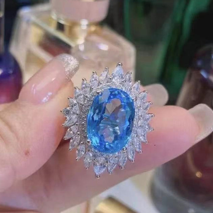 Anillo de lujo para mujer con topacio azul suizo y diamantes