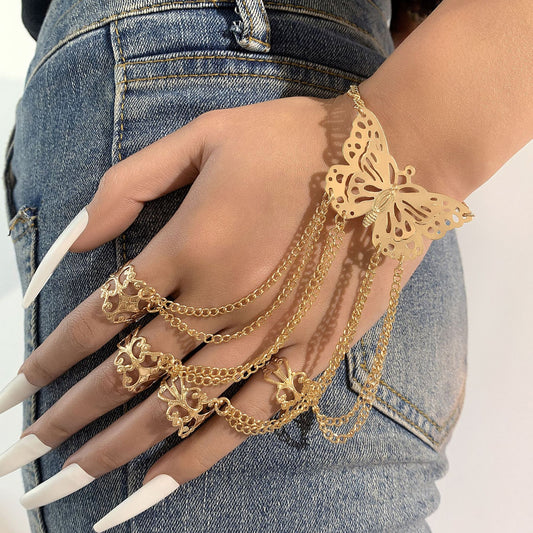 Cadena de mano con forma de mariposa hueca y anillo con borlas: joyería transfronteriza versátil y de moda