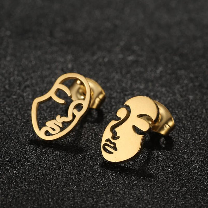 Pendientes de cara humana abstracta, pendientes huecos asimétricos divertidos de estilo europeo y americano, venta al por mayor transfronteriza de AliExpress