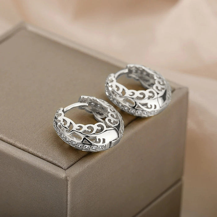 Hollow floral earrings with geometric shapes