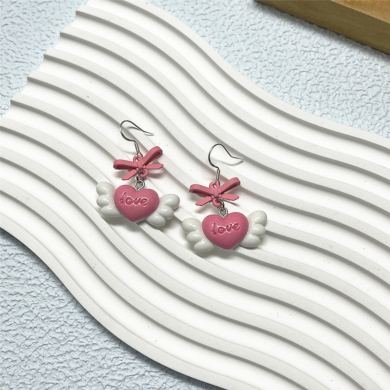 Pendientes de lazo de amor con pintura rosa dulce Pendientes de aguja de plata S925