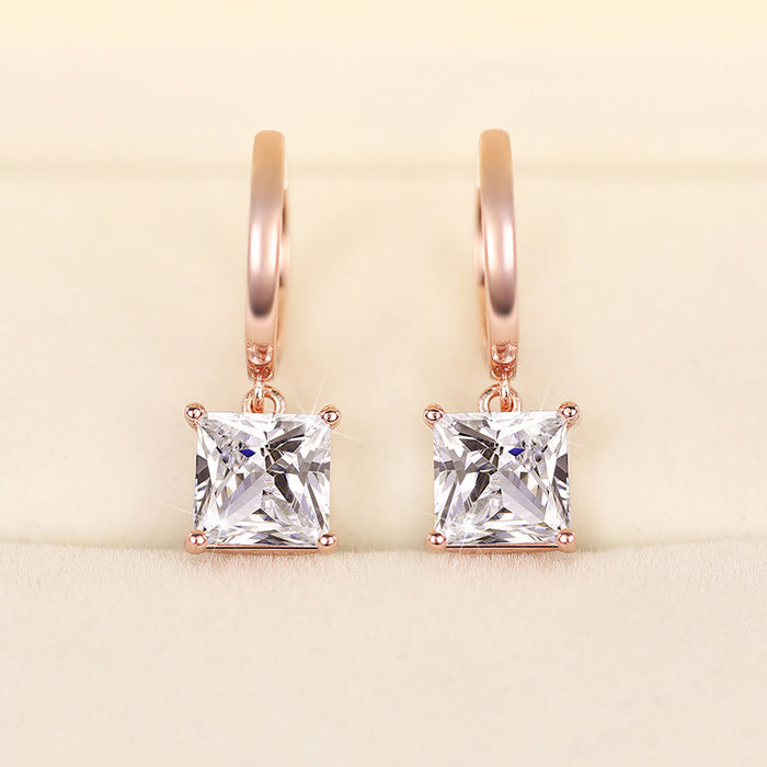 Four-claw zircon earrings