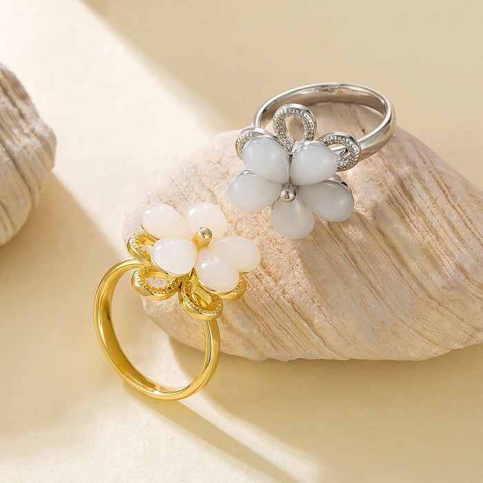 Wholesale cat's eye five-petal flower rotating ring