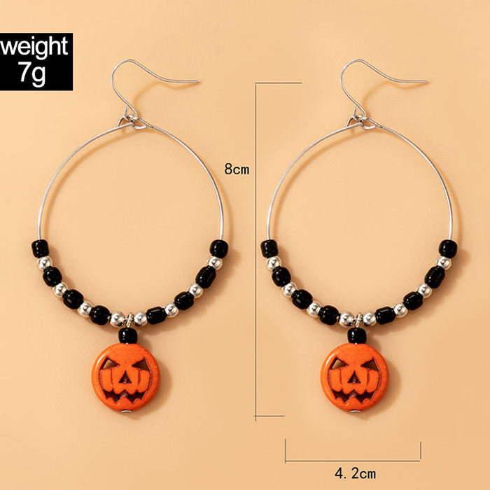 Pendientes de cuerda elástica con cuentas de arroz de colores y calaveras de Halloween