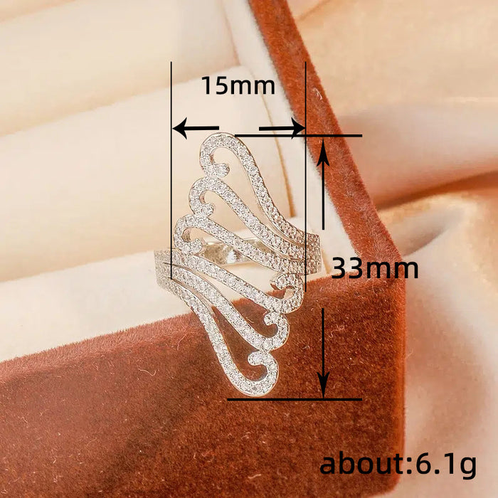 Long exaggerated hollow decorative ring, wave shell pattern ring