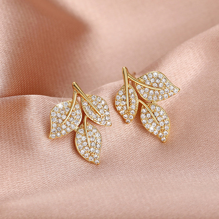 Exquisitos pendientes de hojas de diamantes, versátiles pendientes florales.