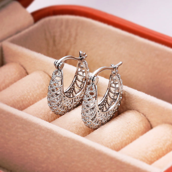 Women's hollow woven pattern earrings