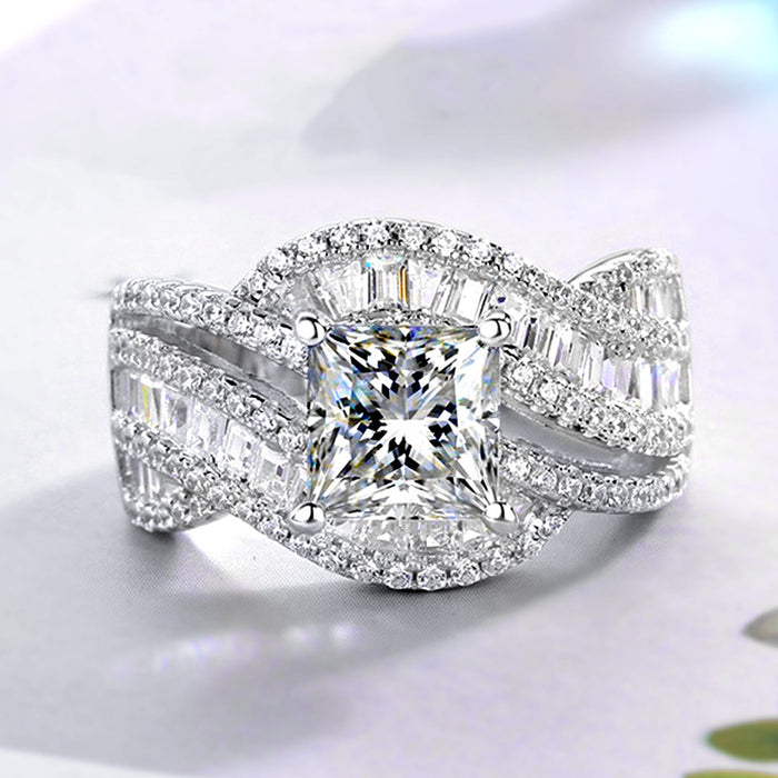 Rotating twist micro-set ring square four-claw engagement ring