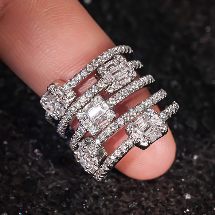 Women's multi-layered ring with micro-set half-circle diamonds