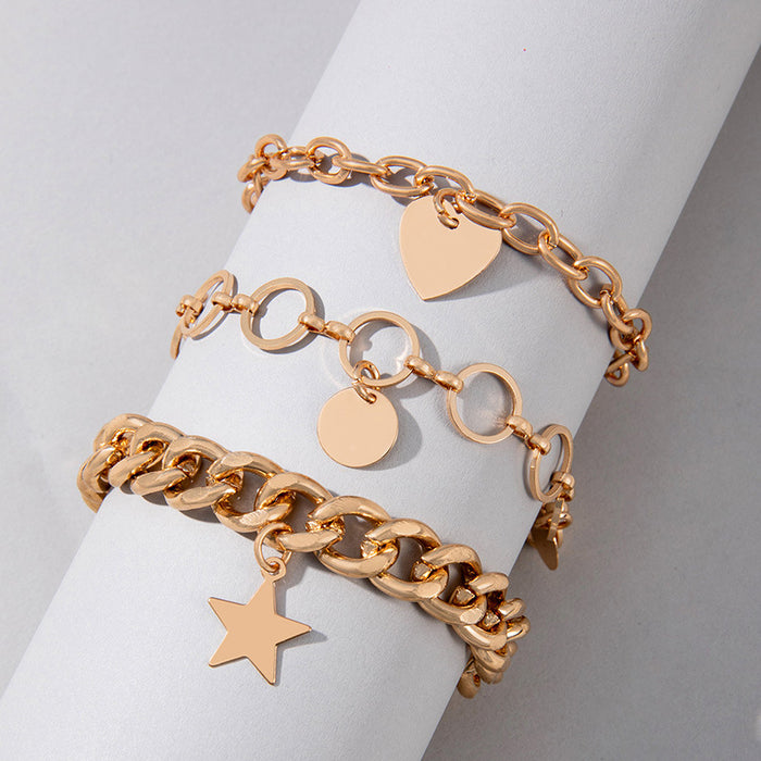 Conjunto de pulseras de cadena con forma de corazón y estrella: cuatro piezas de joyería exagerada para mujer