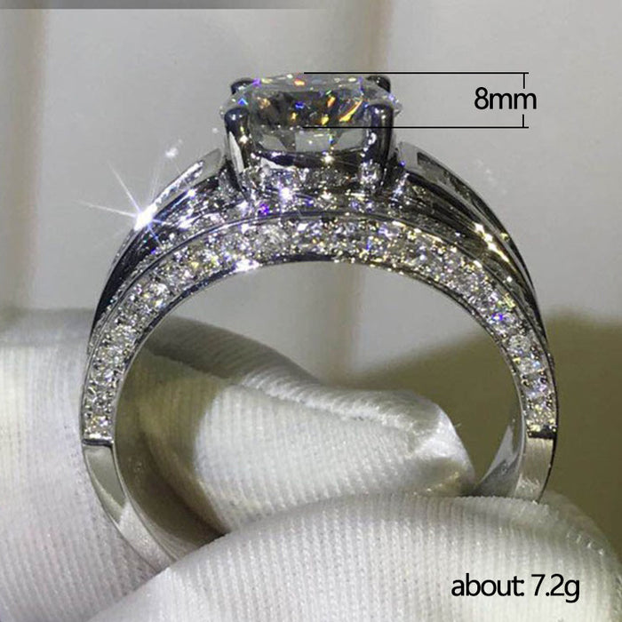 Inlaid round zircon ring European and American style white gold female hand jewelry