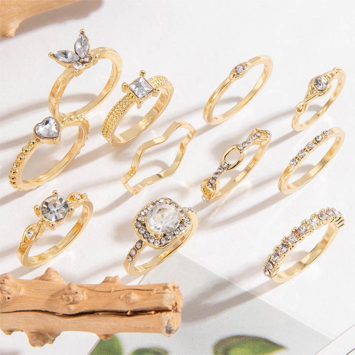 Juego de anillos con forma de corazón y onda de oro: 11 anillos de mariposa de moda