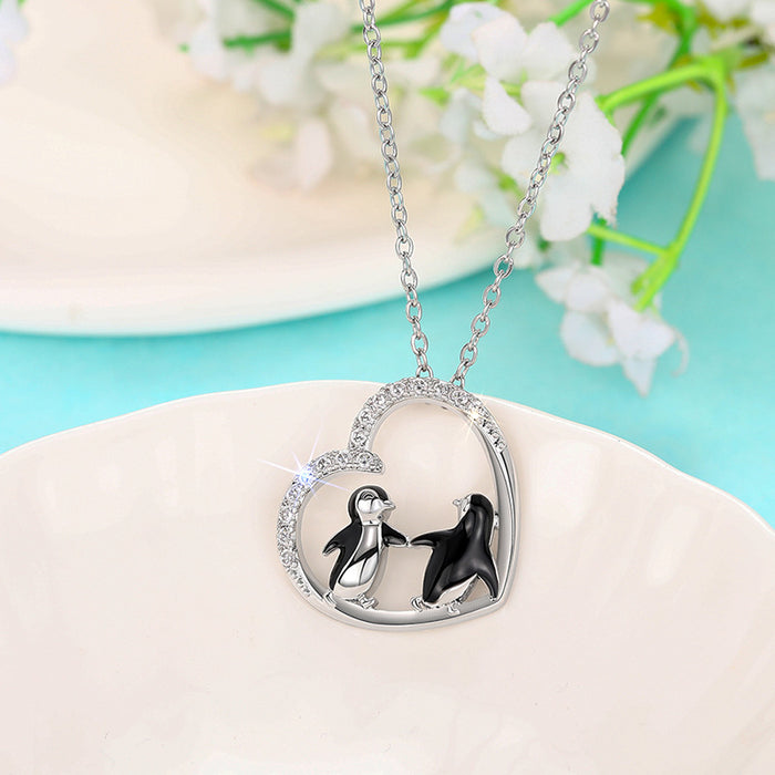 Heart-shaped penguin pendant creative hand in hand girlfriend necklace