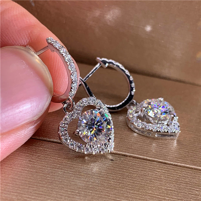 Hollow heart-shaped zircon earrings