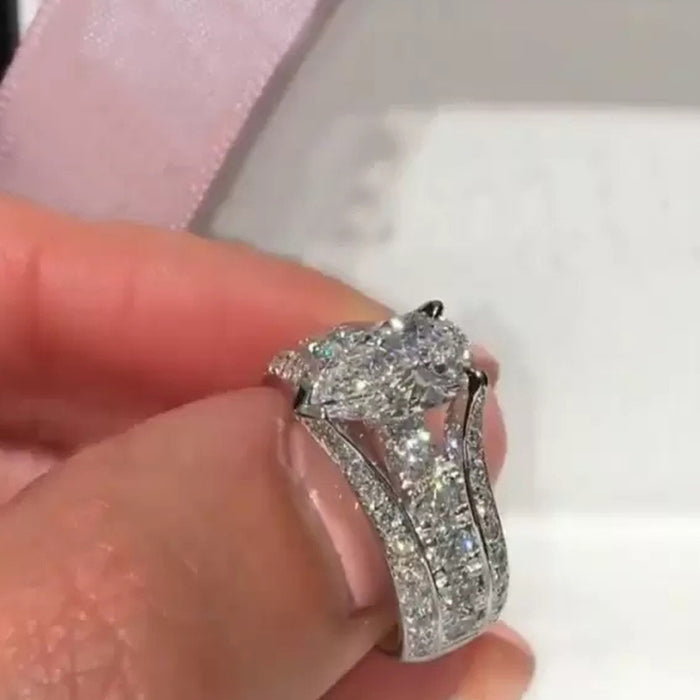 Anillo de diamantes simulados con circonita en forma de lágrima, anillo de bodas popular para mujeres