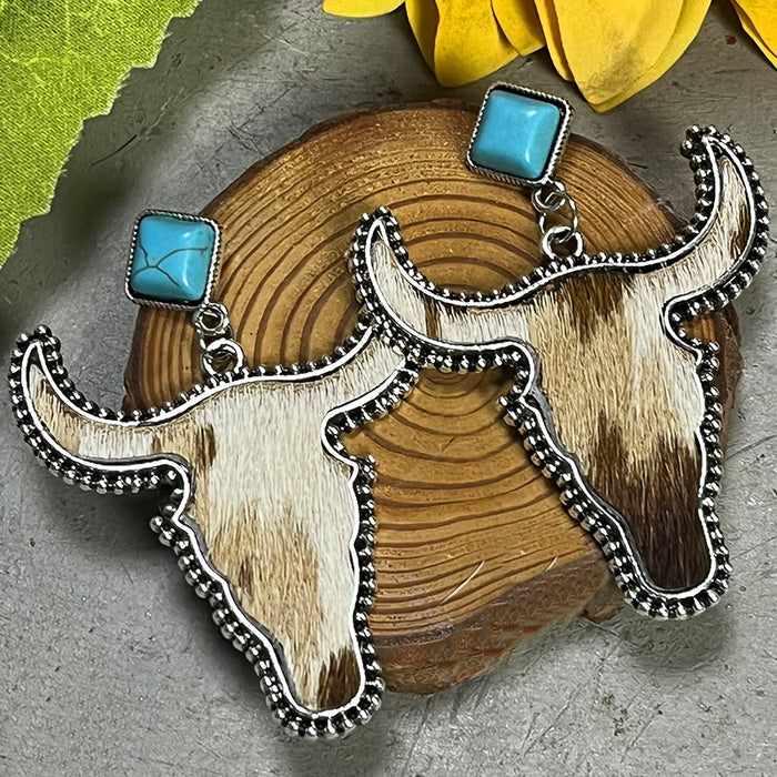 Pendientes de piel de vaca auténtica de estilo bohemio con cabeza de toro y turquesa estilo occidental