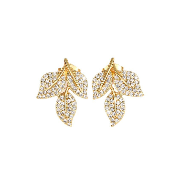 Exquisitos pendientes de hojas de diamantes, versátiles pendientes florales.