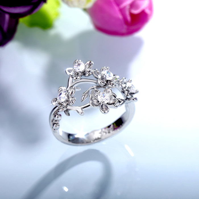 Anillo de circonita floral retro para mujer, joyería de mano versátil y sencilla.