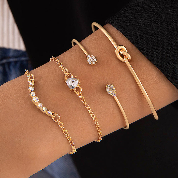 Conjunto de pulseras con forma de corazón y sonrisa: joyería de mujer con puño abierto de cuatro piezas