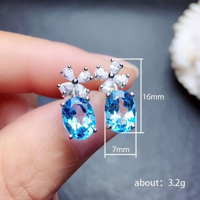 Micro-paved aquamarine zircon earrings and copper-plated white gold stud earrings