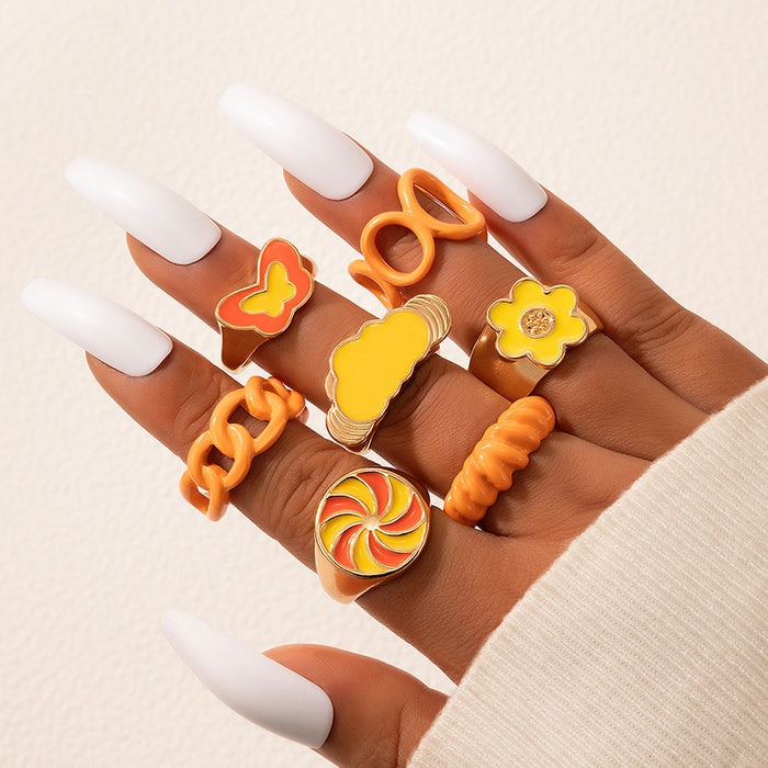 Juego de 7 anillos geométricos abiertos pintados con spray de aceite de color naranja