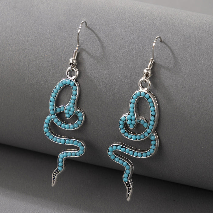 Blue snake-shaped boho earrings