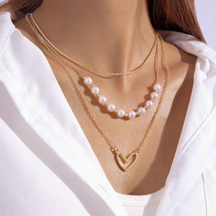 Multi-Layered Pearl and Heart Pendant Necklace