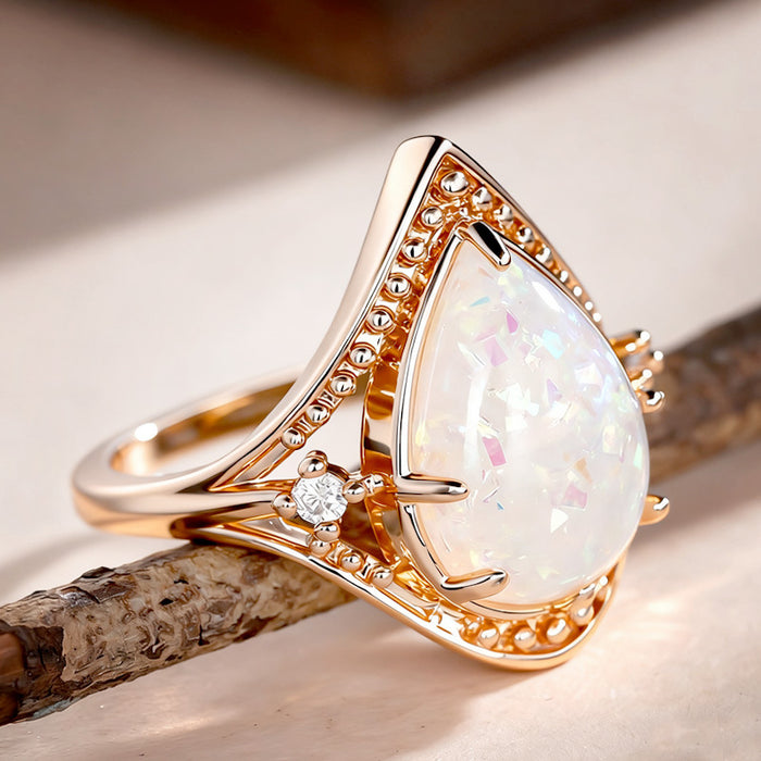 Women's teardrop multi-claw inlaid imitation opal ring