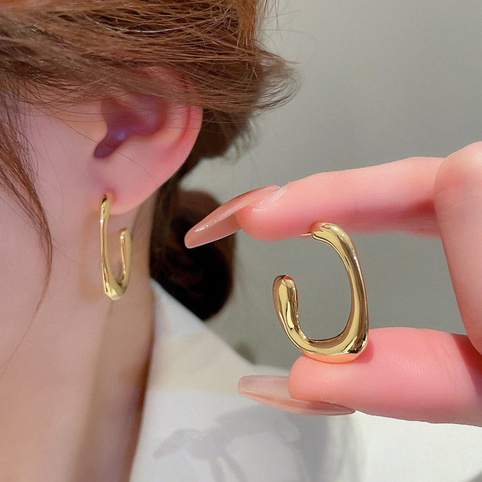 Gold geometric earrings Metallic cool style hoop earrings