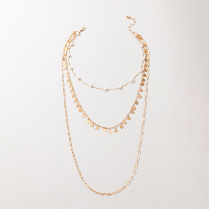 Pearl and Metal Multi-Layer Necklace with Geometric Round Disc Design