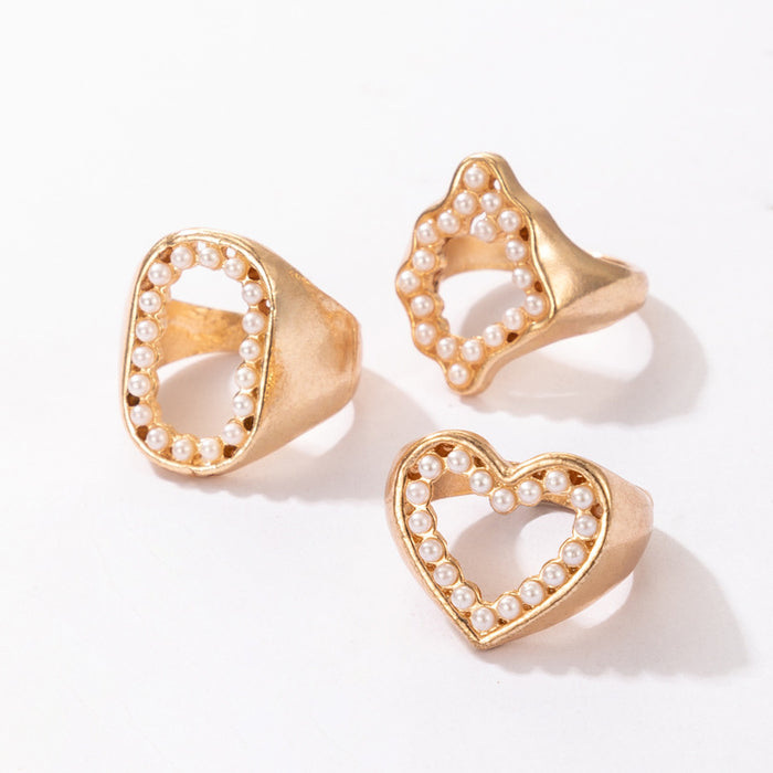 Hollow pearl inlaid irregular geometric O letter ring