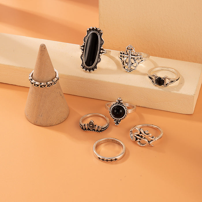 Fashionable and personalized black gemstone diamond cross flower alloy ring eight-piece set