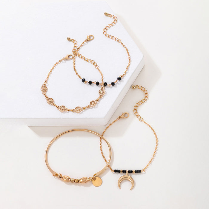 Conjunto de pulseras de cuentas negras y luna de estilo minimalista