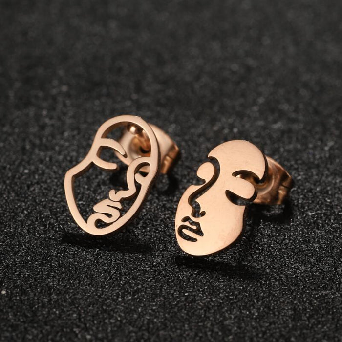 Pendientes de cara humana abstracta, pendientes huecos asimétricos divertidos de estilo europeo y americano, venta al por mayor transfronteriza de AliExpress