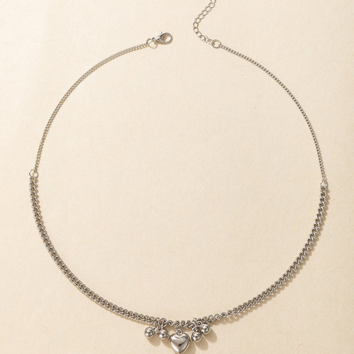 Collar de plata de una sola capa con colgante de corazón con borlas y gotas de agua de metal estilo minimalista Ins