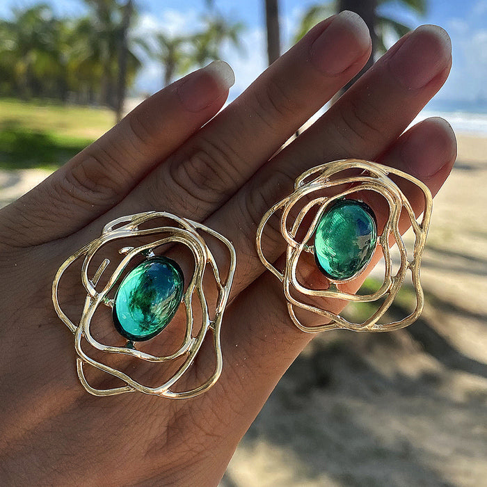 Pendientes geométricos con forma de gota de aceite en color rojo