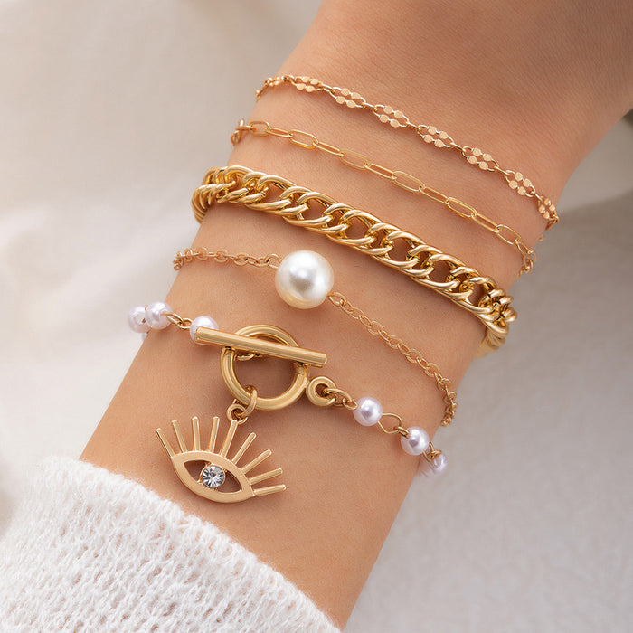 Conjunto de cinco pulseras de perlas y aleación: pulsera de ojo de diamante de imitación para mujer