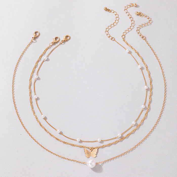 Moon and Shell Triple-Layer Necklace with Cross Pendant