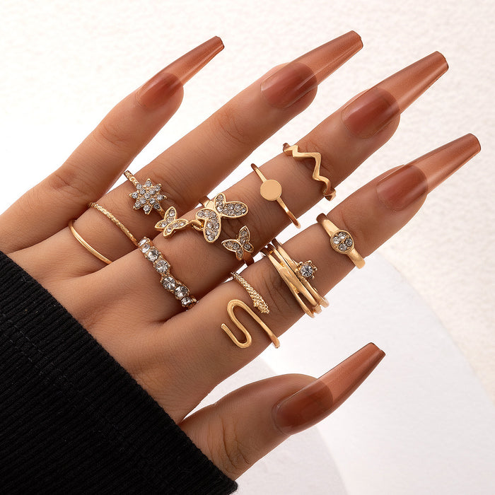 Anillo abierto con forma de serpiente y diamantes en forma de mariposa de estilo dulce, conjunto de nueve piezas con copos de nieve del zodíaco